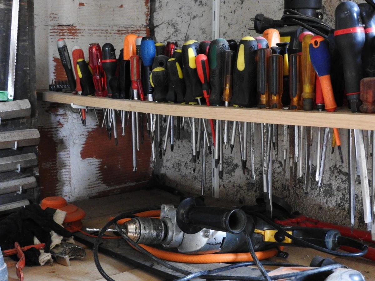 Professional construction tools including Milwaukee power tools, levels, and trade equipment for contractors